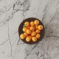 Fresh Ripe Oranges with Green Leaf in Wooden Bowl on Cracked Marble Tabletop
