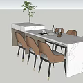 Dining Table Set With Marble Top Brown Chairs Black Legs Gold Accents And Potted Plant