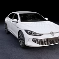 White Modern Sedan With Sleek Aerodynamic Body And Black Alloy Wheels