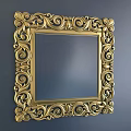 Ornate Golden Framed Square Mirror With Intricate Carvings On Blue Wall