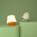 Stylish Table Lamp with White Lampshade and Orange Petal Base on Green Display Stand