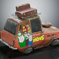 Old Red Car With Suitcases On Roof And Cartoon Graffiti MOVES Lettering