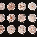 Assorted Decorative Circular Wall Hangings Featuring Intricate Patterns On Display Stands 3d model