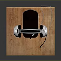 White And Black Headphones On Black Stand With Wooden Platform And Cable