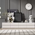 Modern White TV Stand with Globe Artwork Clock Statue and Green Plant on Gray Wall