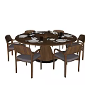 Modern Round Dining Table Set With Wooden Chairs Plates And Glasses