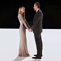 Stylish Couple Holding Hands In Formal Tuxedo And Evening Gown
