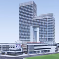 Modern Commercial Complex With High Rise Buildings Low Rise Structures Green Spaces And Circular Plaza