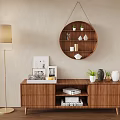 Wooden Entryway Cabinet Sideboard With Photo Frames Books Green Plants Vases And Round Wall Shelf