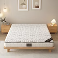 Comfortable Quilted Mattress On Wooden Frame With Nightstand Table Lamp Vase And Framed