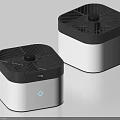 Two White Square mg Digital Gadgets with Black Grille Tops and Modern Design