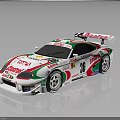 White Race Car With Green Red Stripes KITKAT FERRERO Logos And Rear Wing
