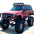 Red Off Road Vehicle with Large Tires and Roof LED Lights on Beach
