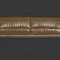 Modern Brown Leather Sofa With Metal Legs And Shiny Surface In Black Background
