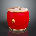 Red Musical Drum Featuring Golden Decorative Rings And Wooden Drumsticks On Surface