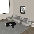Modern Living Room Featuring Light Gray Three Seater Sofa With Pillows And Decorative Wall Art