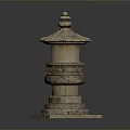 Ancient Traditional Stone Pagoda Structure With Intricate Carvings And Decorative Top