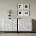 Modern Console Cabinet With Patterned Surface And Vase Decor Plus Wall Art Paintings 3d model