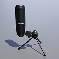 Black Microphone With Tripod Stand On Sleek Gray Background Surface
