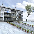 Multi Story Residential Building With Colorful Balconies Stone Pavement And Plants