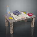 Wooden Table Setup With Bottle Binoculars Old Map Red Plate And Yellow Coins