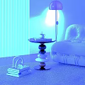 Modern Round Side Table With Stacked Colorful Round Base And Book Cup In Living Room