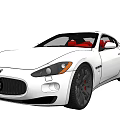 White Maserati Sports Car With Red Leather Seats And Black Alloy Wheels