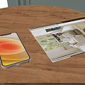 Smartphone And Transparent Tablet On Wooden Round Table With Orange Circular And Room Images