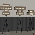 Modern Floor Lamps with Layered Hollow Out Patterns and Black Tripod Base in Minimalist Interior