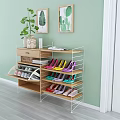 Modern Shoe Cabinet With Multiple Storage Shelves Decorative Plants And Colorful Shoes
