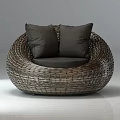 Modern Rattan Armchair With Round Shaped Design And Soft Gray Cushions For Living Room