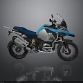 BMW Adventure Motorcycle With Blue And Silver Body Windshield Side Cases And Black Tires