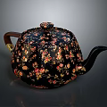 Elegant Black Teapot With Floral Patterns Wooden Handle And Gold Accents