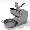 Gray Kitchen Appliance With Flip Top Lid Black Handle And Round Tray