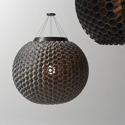 Modern Dark Spherical Pendant Light With Hexagonal Honeycomb Texture And Warm Glow 3d model