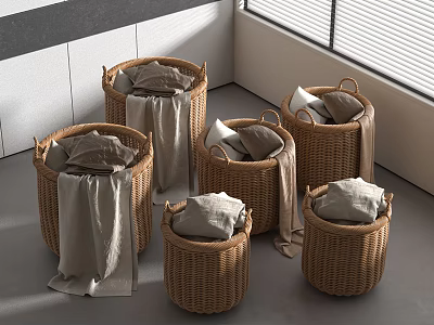 Multiple Woven Storage Baskets Holding Soft Linen Clothes in Indoor Home Space 3d model