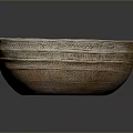 Traditional Handcrafted Clay Bowl With Intricate Carved Patterns And Textured Surface