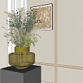 Golden Glass Vase Holding Light Colored Dried Flowers On Modern Shelf With Wall Decor