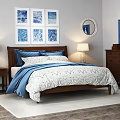Double Bed with Blue White Bedding Nightstands Table Lamps Wall Art Dresser on Rug