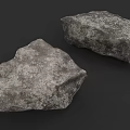 Two Gray Natural Stone Pieces With Textured Surface On Black Background