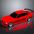 Red Sports Car With Black Rear Spoiler Silver Wheels And Reflection On Gray Background
