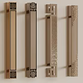 Ornate Metallic Door Handles with Various Decorative Patterns and Traditional Designs