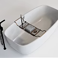 Modern White Bathtub With Black Faucet And Metal Rack Holding Gray Sponge