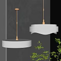 Modern White Striped Pendant Lights Hanging Over Dark Wall With Green Plants