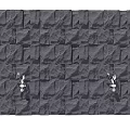 Textured Irregular Stone Background Wall With White Small Flowers in Corners