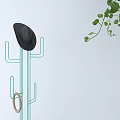 Green Cactus Shaped Coat Racks With Black Hat Umbrella On White Wall Gray Floor