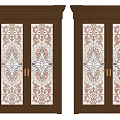 Elegant Wooden Double Doors With Intricate Patterned Glass And Golden Handles