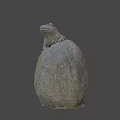 Gray Stone Frog Sculpture With Textured Surface And Yellow Spots On Natural Rock