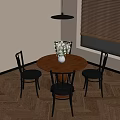 Interior View Of Dining Space With Round Wooden Table White Vase Flowers And Black Chairs