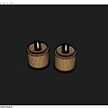 Two Lit Candles in Metallic Containers as Decorative Household Items